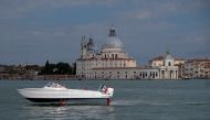 A new Swedish-designed electric boat is tested during the Salone Nautico - Venice Boat Show, in the lagoon city of Venice, Italy June 6, 2021. Picture taken June 6, 2021. REUTERS/Manuel Silvestri
