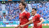 Russia's Aleksei Miranchuk celebrates scoring their first goal with Vyacheslav Karavayev Pool via REUTERS/Kirill Kudryavtsev
