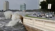 Waves crash against the balustrades on Bayshore Boulevard during high tide after Tropical Storm Elsa churns up the Gulf coast, in Tampa, Florida, U.S., July 7, 2021. REUTERS/Octavio Jones
