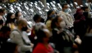 Empty chairs are pictured as people between 30 and 39 years old receive a dose of the AstraZeneca coronavirus disease (COVID-19) vaccine during a mass vaccination in Mexico City, Mexico July 6, 2021. REUTERS/Edgard Garrido
