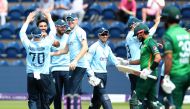 Cricket - First One Day International - England v Pakistan - Sophia Gardens, Cardiff, Wales, Britain - July 8, 2021 England's Saqib Mahmood celebrates taking the wicket of Pakistan's Babar Azam, caught by Zak Crawley with teammates Action Images via Reute