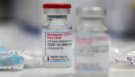 FILE PHOTO: A vial of the Moderna COVID-19 vaccine is seen at a clinic in Aschaffenburg, Germany, January 15, 2021. REUTERS/Kai Pfaffenbach/File Photo
