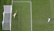 Soccer Football - Euro 2020 - Final - Italy v England - Wembley Stadium, London, Britain - July 11, 2021 Italy's Gianluigi Donnarumma saves a penalty from England's Jadon Sancho during a penalty shootout REUTERS/Carl Recine
