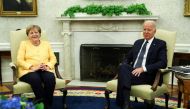 U.S. President Joe Biden holds a bilateral meeting with German Chancellor Angela Merkel in the Oval Office at the White House in Washington, U.S., July 15, 2021. REUTERS/Tom Brenner
