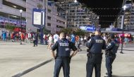 Police oversee the exiting of fans after the game between the Washington Nationals and the San Diego Padres was suspended due to gunshots outside the stadium at Nationals Park. Mandatory Credit: Brad Mills-USA TODAY Sports