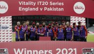 Cricket - Third Twenty20 International - England v Pakistan - Emirates Old Trafford, Manchester, Britain - July 20, 2021 England team celebrate winning the match and the series Action Images via Reuters/Lee Smith

