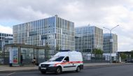 An ambulance drives near a hospital for patients infected with the coronavirus disease (COVID-19) on the outskirts of Moscow, Russia July 2, 2021. REUTERS/Tatyana Makeyeva
