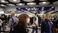 Arriving passengers queue at UK Border Control at the Terminal 5 at Heathrow Airport in London, Britain June 29, 2021. REUTERS/Hannah Mckay

