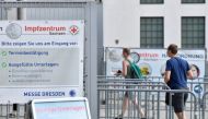 People arrive to receive a vaccine against COVID-19 at a centre at in Dresden, Germany, July 29, 2021. REUTERS/Matthias Rietschel/File Photo

