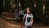 Jude Walker, 11, during his 210 miles (340 km) walk from Yorkshire to London over 21 days to raise awareness for 'the zero carbon campaign' petition, which calls for the government to implement a Carbon Tax, in Milton Keynes, Britain August 10, 2021. Pict