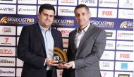 SponixTech Founder and CEO Mohammad Ali Abbaspour (left) and Mohsen Rajabi, Business Development Director for Sponix, during an awarding ceremony. 