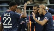 Soccer Football - Ligue 1 - Stade de Reims v Paris St Germain - Stade Auguste-Delaune, Reims, France - August 29, 2021 Paris St Germain's Kylian Mbappe celebrates scoring their second goal with teammates REUTERS/Benoit Tessier
