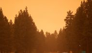 Heavy smoke from the Caldor Fire is seen along highway 50, in South Lake Tahoe, California, U.S., August 29, 2021. REUTERS/Fred Greaves
