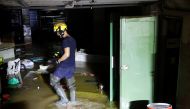 A firefighter inspects a place affected by floods caused by heavy rains in ALCANAR, Spain, September 1, 2021. REUTERS/Eva Manez 