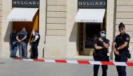 French police stand in front of the Bulgari jewellery store following a robbery at Place Vendome in Paris, France, September 7, 2021. Reuters/Eric Gaillard