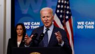 FILE PHOTO: U.S. President Joe Biden delivers remarks on his administration's coronavirus disease (COVID-19) response, as Vice President Kamala Harris stands by in the Eisenhower Executive Office Building's South Court Auditorium at the White House in Was