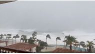 Trees sway amidst heavy rain as Hurricane Olaf sweeps through Cabo San Lucas, Baja California, Mexico, September 9, 2021, in this still image taken from a social media video. Dominique Torres Williams/via REUTERS