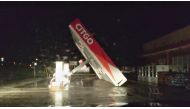 A CITGO gas station roof is blown away by Tropical Storm Nicholas in Matagorda, Texas, U.S. in this still image from a social media video taken on September 13, 2021. Andrew Dubya/via REUTERS