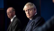 Britain's Prime Minister Boris Johnson looks on during a news conference on the coronavirus disease (COVID-19) in the Downing Street Briefing Room, London, Britain September 14, 2021. Richard Pohle/Pool via REUTERS

