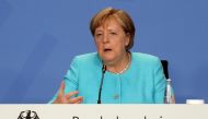 German Chancellor Angela Merkel attends a news conference after talks with directors of the ILO, IMF, OECD, World Bank and more to discuss questions on the current state of the global economic situation, in Berlin, Germany August 26, 2021. Wolfgang Kumm/P