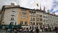 People eat on a terrace during easing of lockdown measures against the coronavirus disease (COVID-19) outbreak in Geneva, Switzerland, May 5, 2021. Picture taken May 5, 2021. REUTERS/Denis Balibouse