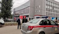 A car of Russia's National Guard is seen at the scene after a gunman opened fire at the Perm State University in Perm, Russia September 20, 2021. REUTERS/Anna Vikhareva 