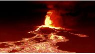 Screen grab from a video taken by a night drone shows a volcano erupting and tongues of lava in La Palma, Spain September 22, 2021. Spanish Emergency Military Unit (UME)/Reuters TV/Handout via REUTERS THIS IMAGE HAS BEEN SUPPLIED BY A THIRD PARTY.
