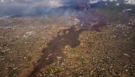 Lava from a volcano eruption flows in El Paso, on the Canary Island of La Palma, Spain, September 23, 2021. Picture taken September 23, 2021. Emilio Morenatti/Pool via REUTERS