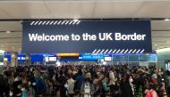 Queues of people wait in line at U.K. citizens arrivals at Heathrow Airport in London, Britain, September 1, 2021. REUTERS/Guy Faulconbridge/File Photo