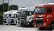 File photo: Lorries are seen at an HGV parking, at Cobham services on the M25 motorway, Cobham, Britain, August 31, 2021. REUTERS/Peter Cziborra/File Photo