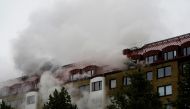 Smoke comes out of windows after an explosion hit an apartment building in Annedal, central Gothenburg, Sweden September 28, 2021. Larsson Rosvall / TT News Agency/via REUTERS
