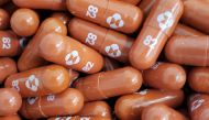 FILE PHOTO: An experimental COVID-19 treatment pill called molnupiravir being developed by Merck & Co Inc and Ridgeback Biotherapeutics LP, is seen in this undated handout photo released by Merck & Co Inc and obtained by Reuters May 17, 2021. Merck & Co I