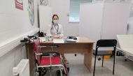 Tatiana Kadochnikova, a GP, waits for recipients of the coronavirus disease (COVID-19) vaccine at a vaccination point opened in a Leroy Merlin hardware store in Belgorod, Russia August 10, 2021. Picture taken August 10, 2021. REUTERS/Polina Nikolskaya