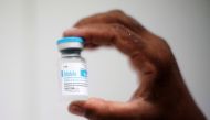 A nurse shows a dose of Abdala vaccine against the coronavirus at a vaccination center in Havana, Cuba, June 23, 2021. REUTERS/Alexandre Meneghini/File Photo