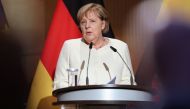 Outgoing German Chancellor Angela Merkel speaks at a ceremony to mark the 31st anniversary of Germany's Unification Day, in the city of Halle, Germany, October 3, 2021. Jan Woitas/Pool via REUTERS