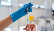 A nurse prepares a syringe with a dose of the Moderna coronavirus disease (COVID-19) vaccine at Enfermera Isabel Zendal hospital in Madrid, Spain, July 23, 2021. REUTERS/Juan Medina