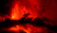 The Cumbre Vieja volcano continues to erupt on the Canary Island of La Palma, as seen from El Paso, Spain, October 5, 2021. REUTERS/Juan Medina