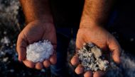 Andres Hernandez, manager of salt flats Salinas de Teneguia, shows how were damaged by the action of the ashes caused by the eruption of the Cumbre Vieja volcano in Fuencaliente, on the Canary Island of La Palma, Spain, October 7, 2021. Picture taken Octo