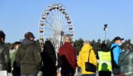 Invited guests arrive for a party with county fair and factory tour on the construction site of Tesla's electric car factory in Gruenheide, near Berlin, Germany, October 9, 2021. Reuters/Annegret Hilse