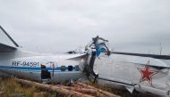 The wreckage of the L-410 plane is seen at the crash site near the town of Menzelinsk in the Republic of Tatarstan, Russia October 10, 2021. Russia's Emergencies Ministry/Handout via REUTERS