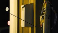 An arrow left in a wall is seen after several people were killed and others were injured by a man using a bow and arrows to carry out attacks, in Kongsberg, Norway, October 13, 2021. Terje Bendiksby/NTB/via REUTERS