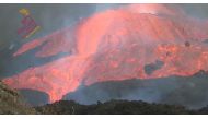 Lava flows as the Cumbre Vieja volcano continues to erupt on the Canary Island of La Palma, Spain October 14, 2021 in this still image taken from a social media video. @INVOLCAN/ via REUTERS