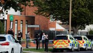 Police are seen at the scene where MP David Amess was stabbed during constituency surgery, in Leigh-on-Sea, Britain October 15, 2021. REUTERS/Andrew Couldridge
