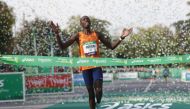 Kenya’s Elisha Rotich celebrates after winning the elite men's race and setting a new record Reuters/Gonzalo Fuentes

