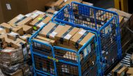 FILE PHOTO: Packages are seen inside Amazon's JFK8 distribution center in Staten Island, New York, U.S. November 25, 2020. REUTERS/Brendan McDermid/File Photo
