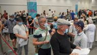 People wait to receive a vaccine against the coronavirus disease (COVID-19) at a vaccination centre in Luzhniki Stadium in Moscow, Russia July 8, 2021. REUTERS/Tatyana Makeyeva