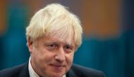 Britain's Prime Minister Boris Johnson speaks to the media as he visits at a COVID-19 vaccination centre at Little Venice Sports Centre, in London, Britain October 22, 2021. Matt Dunham/Pool via REUTERS