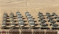 Russian service members line up during military drills carried out by the Russia-led Collective Security Treaty Organisation (CSTO) at the Harb-Maidon training ground, located near the Tajik-Afghan border in the Khatlon region, Tajikistan October 23, 2021