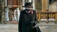 FILE PHOTO: Queen Elizabeth attends a ceremony in London's Westminster Abbey to mark the centenary of the burial of the Unknown Warrior, in Britain November 4, 2020. Picture taken November 4, 2020. Aaron Chown/Pool via REUTERS