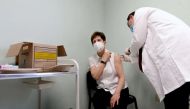 Healthcare worker Adrienne Kertesz, receives the first injection nationwide, with a dose of Pfizer-BioNTech COVID-19 vaccine at the Del-Pest Central Hospital as the coronavirus disease (COVID-19) outbreak continues, in Budapest, Hungary, December 26, 2020